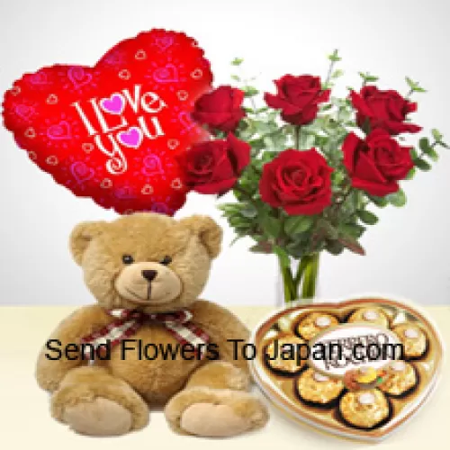 7 rode rozen met wat varens in een glazen vaas, een schattige 14 inch grote bruine teddybeer, 8 stuks hartvormige Ferrero Rocher en een "Ik hou van je" ballon