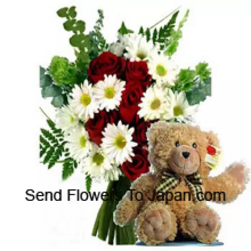 Boeket van rode rozen en witte gerbera's samen met een schattige 12 inch grote bruine teddybeer
